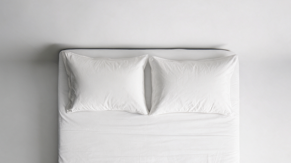 Copricuscino e Coprimaterasso Antiacaro Acarbasic® – letto allestito vista frontale