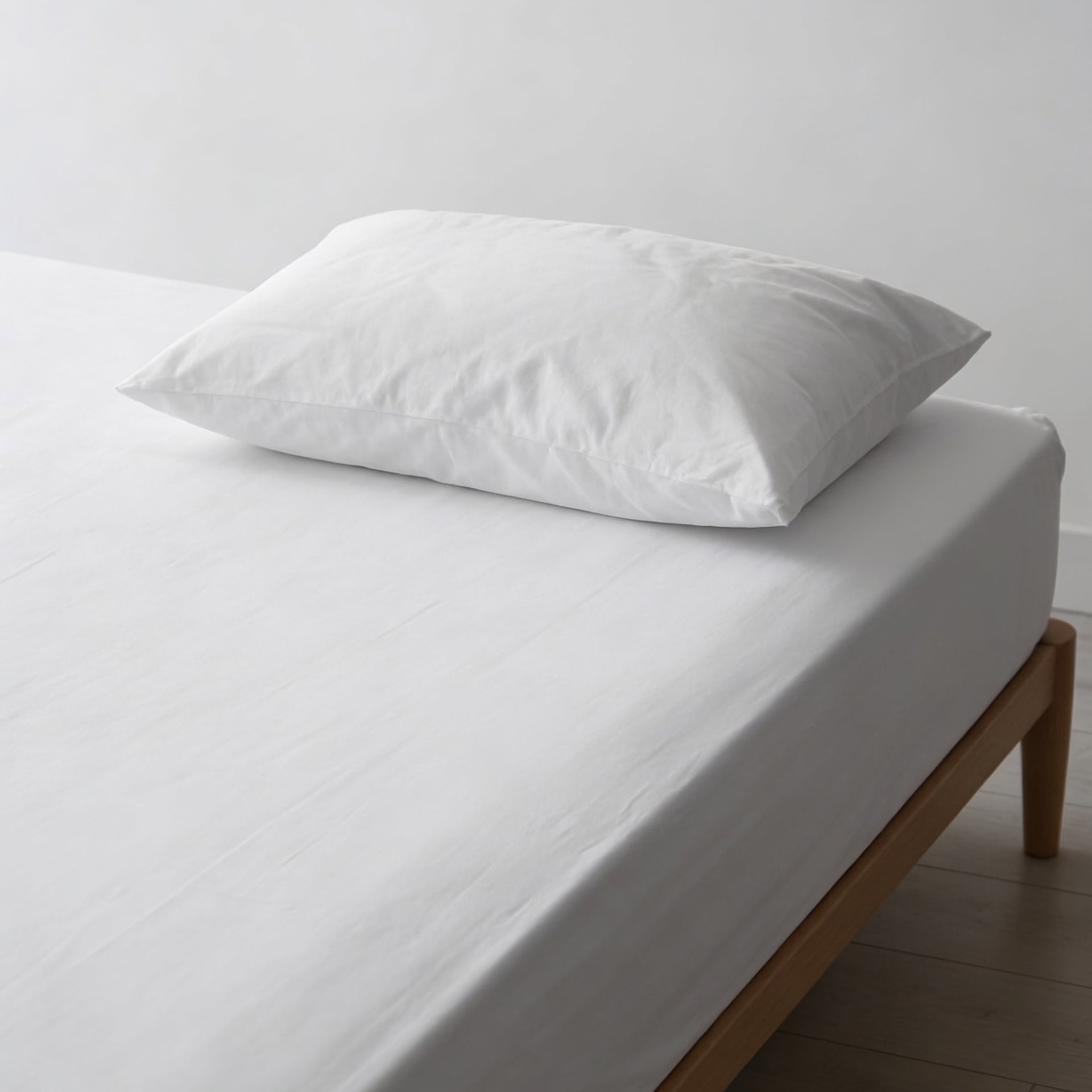 Copricuscino Antiacaro Acarbuster® – letto allestito vista frontale