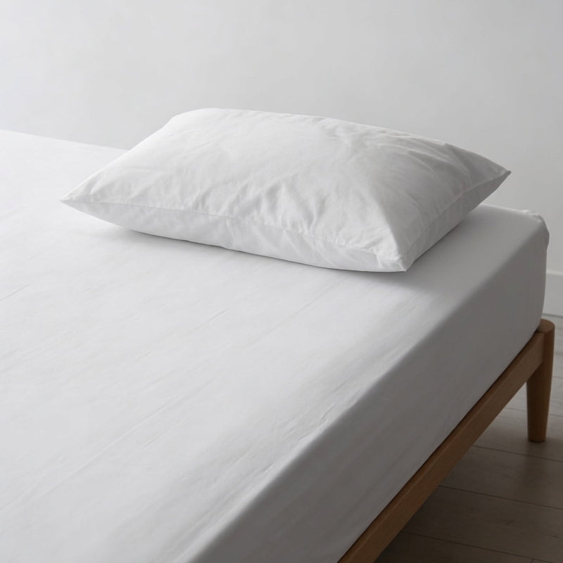 Copricuscino Antiacaro Acarbuster® – letto allestito vista frontale