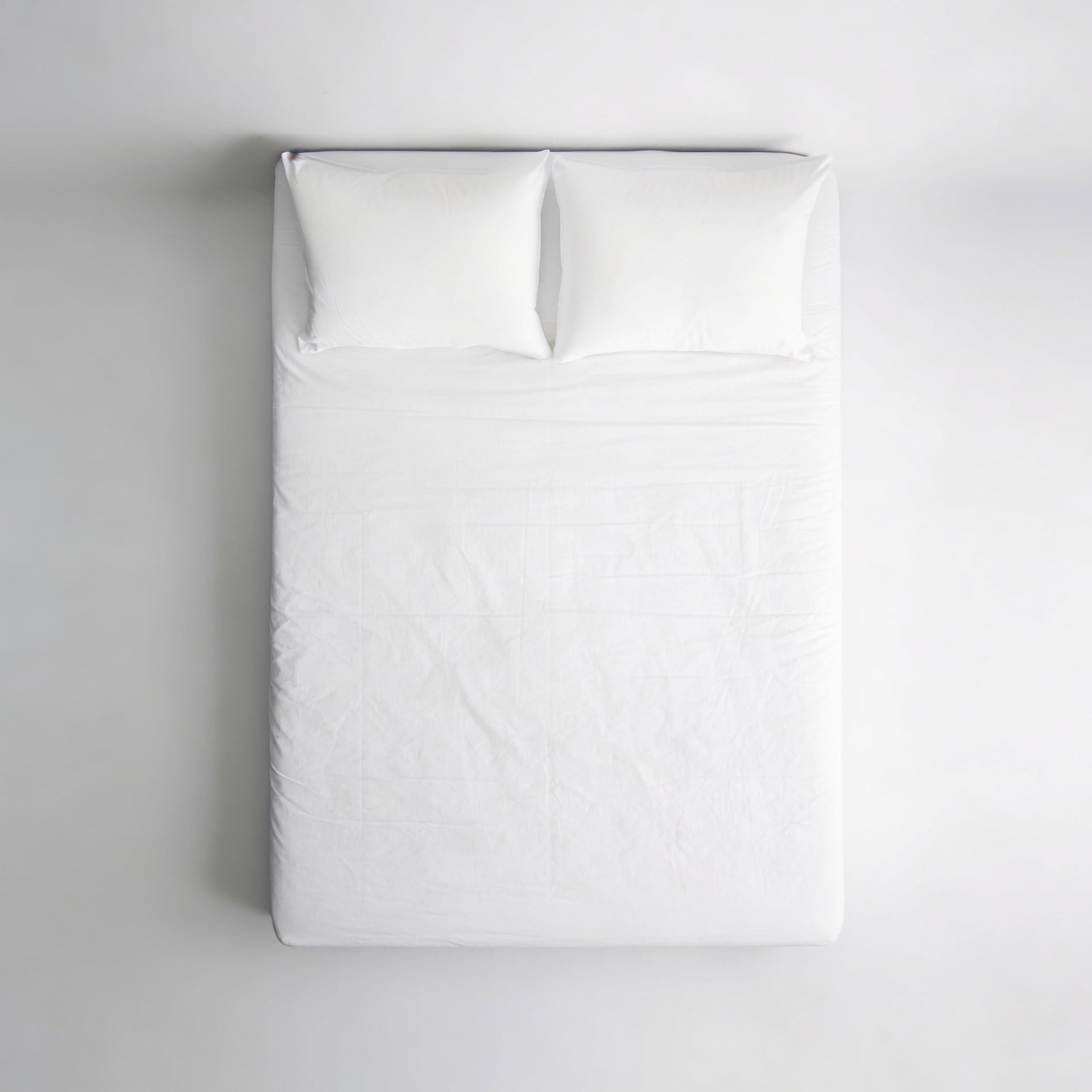 Copricuscino e Coprimaterasso Antiacaro Acarbasic® – letto allestito vista frontale