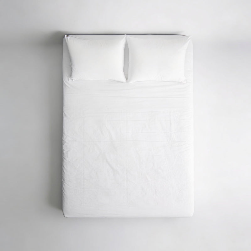 Copricuscino e Coprimaterasso Antiacaro Acarbasic® – letto allestito vista frontale